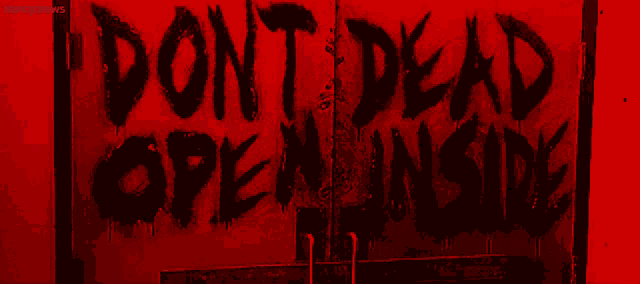 a sign that says do n't dead open inside on it