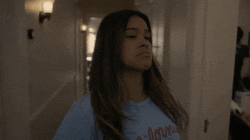 a woman wearing a t-shirt that says donna on it
