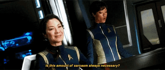 two women are standing next to each other and one of them says " is this amount of sarcasm always necessary ? "