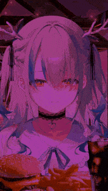 a girl is eating a hamburger and french fries