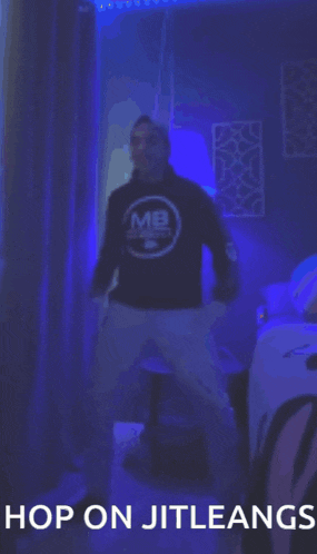 a blurry picture of a man dancing with the words hop on jitleangs above him