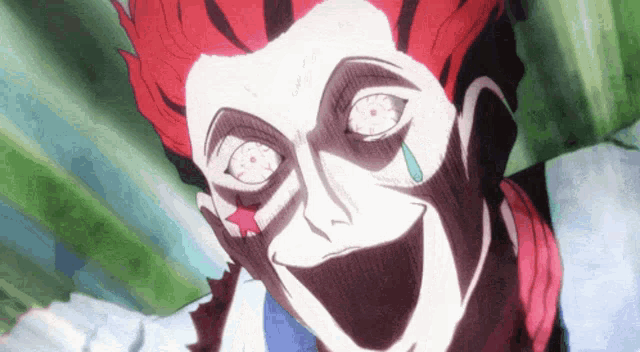 a cartoon character with red hair and white eyes has a red star on his face