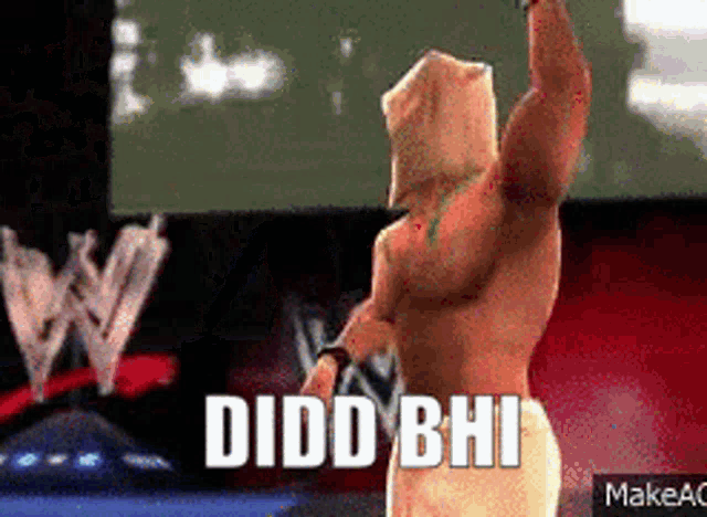 a man with a hood on his head is standing in front of a screen that says " didd bhi "