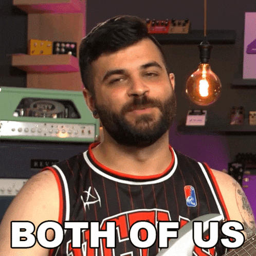 a man with a beard is wearing a jersey that says both of us on it