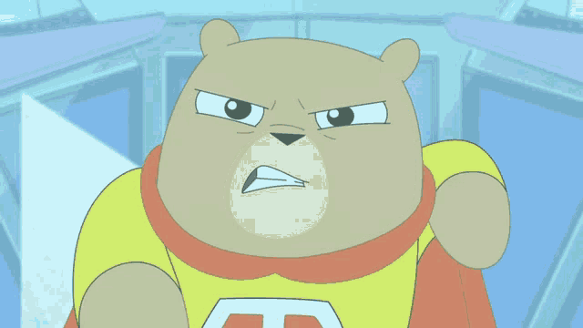 a cartoon bear wearing a yellow shirt with the letter t on the chest