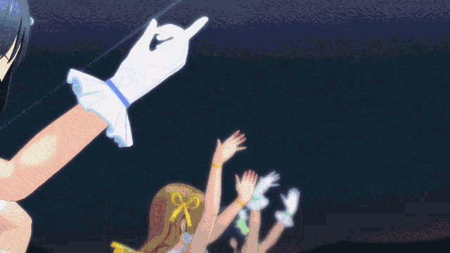a group of anime girls are dancing on a stage at night