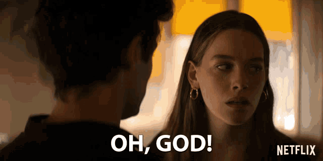 a man and a woman are looking at each other and the woman says " oh god "