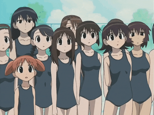 a group of girls in swimsuits are standing in a line