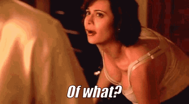 a woman in a bra says of what while looking at a man