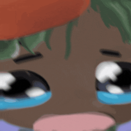 a close up of a person 's face with tears on their eyes