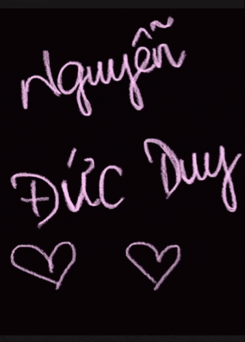 the name duc duy is written in white chalk on a black board