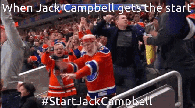 a crowd of people watching a hockey game with a caption that says " when jack campbell gets the start "