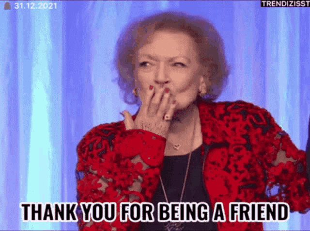 an elderly woman in a red jacket is covering her mouth with her hand and saying thank you for being a friend .