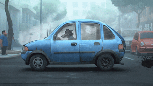a blue car with a wolf in the driver 's seat is driving down a street