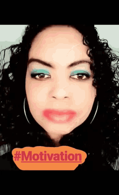 a woman with curly hair has a sticker that says #motivation on it