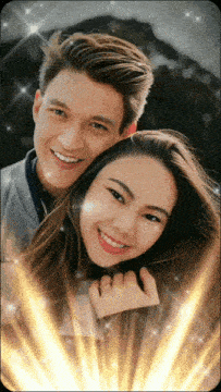 a man and woman are posing for a picture together