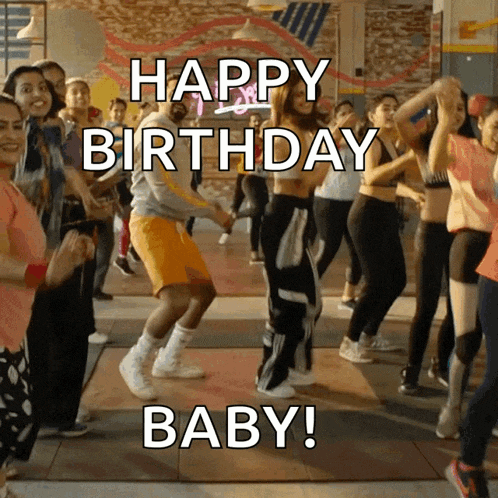 a group of people are dancing in a gym with the words happy birthday baby