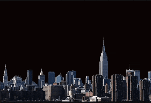 a large monster is standing in front of a city