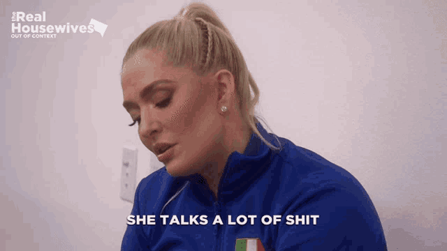 a woman says she talks a lot of shit in front of a real housewives logo