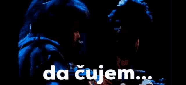 a man smoking a cigarette in a dark room with the words da cujem written on the bottom