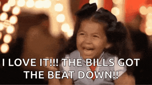 a little girl is crying with the words " i love it !! the bills got the beat down !! "