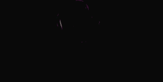a glow in the dark image of a person with a skull on their shirt