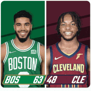 two basketball players from boston and cleveland are standing next to each other