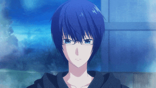a blue haired anime character with glasses looks at the camera
