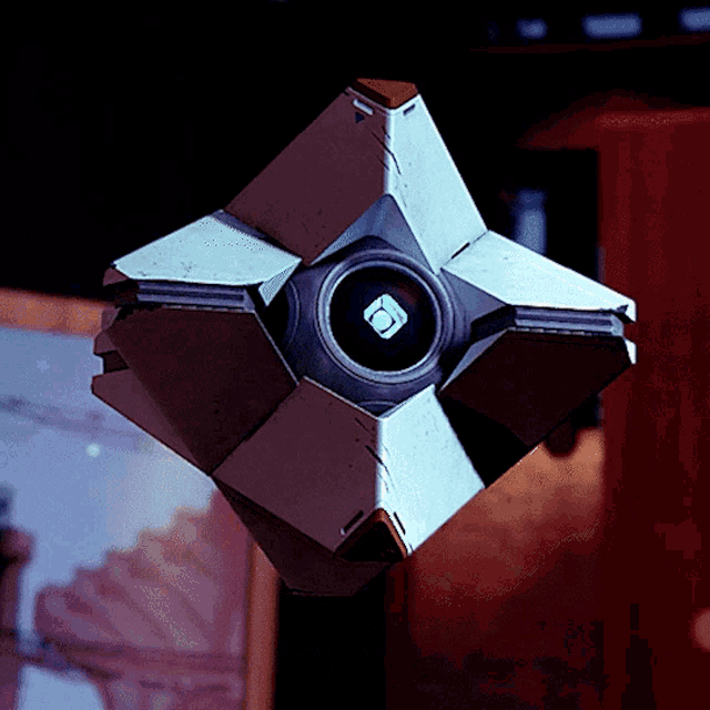 a white cube with a black circle in the middle that says io
