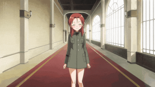 a girl with red hair is standing in a long hallway