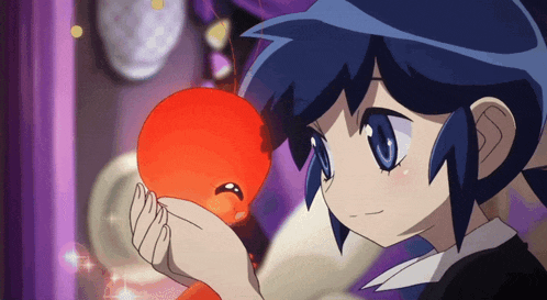 a girl with blue hair is holding a red object in her hands