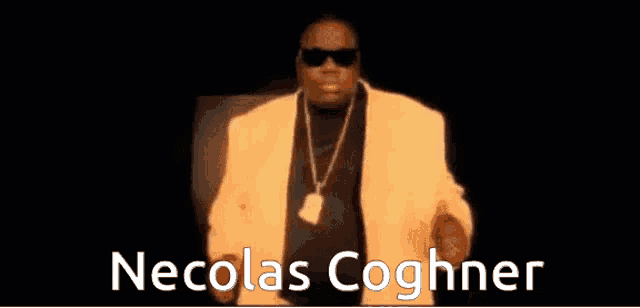 a man wearing sunglasses and a yellow jacket with the name nicolas coghner written on the bottom