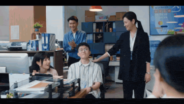 a woman stands in front of a sign that says " accurate "