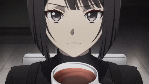 a girl with short black hair is holding a cup of tea
