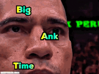a close up of a man 's face with the words big ank and time written on it