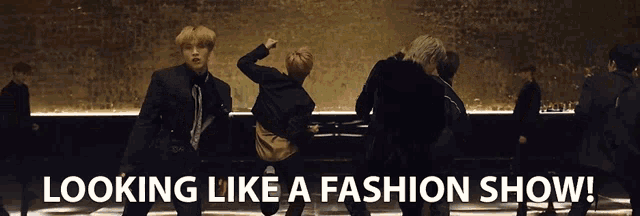 a group of men are dancing with the words looking like a fashion show