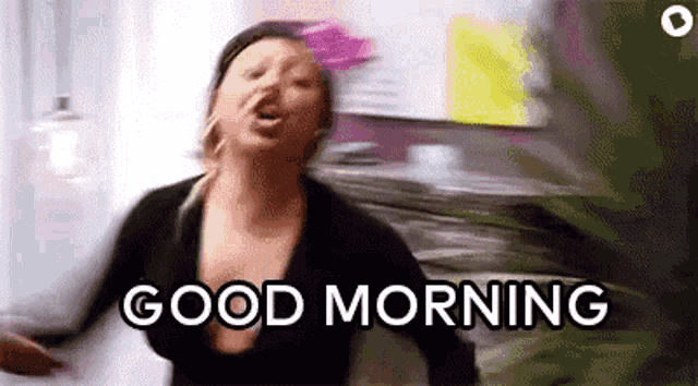 a woman is shouting and saying `` good morning '' .