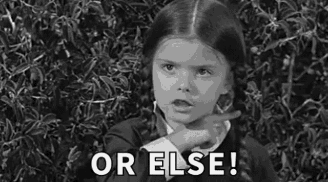 a little girl is pointing at something in a black and white photo and saying `` or else ! ''