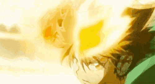 a close up of a person 's head with a yellow glow coming from it