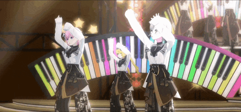 three anime girls are dancing on a stage in front of a large piano keyboard .