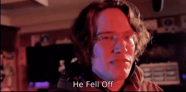 a man with glasses says he fell off in a video