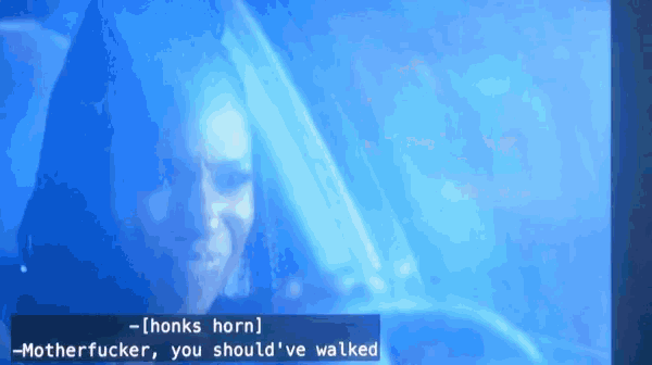 a woman in a car says honks horn