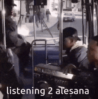 a group of people are sitting on a bus with the words listening 2 alesana written on the bottom