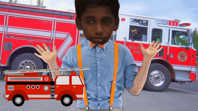 a boy standing in front of a fire truck with the number e-4 on it