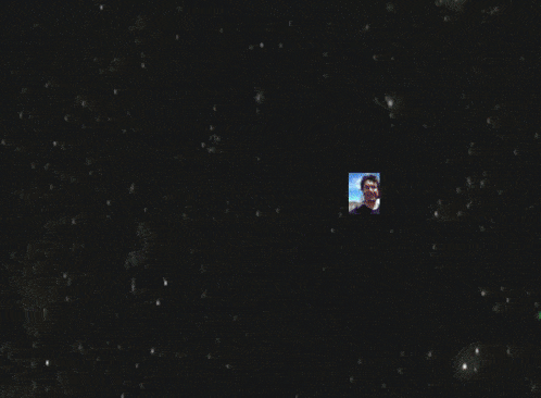 a picture of a man in a black shirt is surrounded by a green light