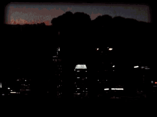 a blurry picture of a fire with a few spots of light