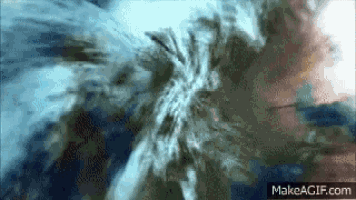 a computer generated image of a dandelion blowing in the wind on make a gif.com