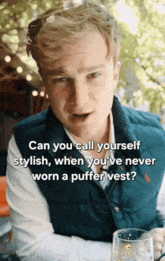 a man wearing a puffer vest is talking about calling yourself stylish