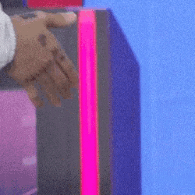 a close up of a person 's hand with a tattoo on it