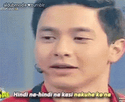 a close up of a man 's face with the words hindi na hindi na kasi nakuha ko na